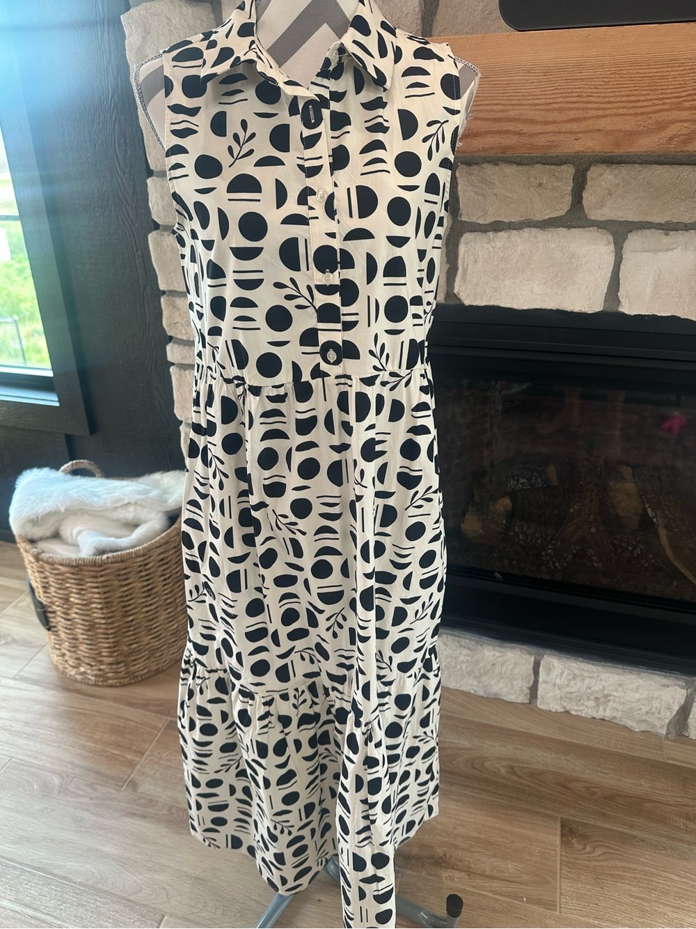 Rachel Zoe is a sleeveless cotton-blend midi dress featuring a bold black